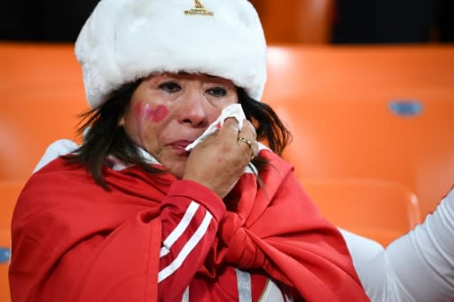 A long and expensive odyssey and all for an early exit -- one Peru's fan cries after a loss to France in Yekaterinburg as a first campaign in 36 years came to naught