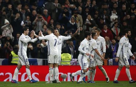 Football Soccer - Real Madrid v Real Sociedad - Spanish Liga Santander - Santiago Bernabeu, Madrid, Spain - 29/01/17 Real Madrid's Alvaro Morata (L) celebrates scoring a goal with team mates. REUTERS/Susana Vera/Files