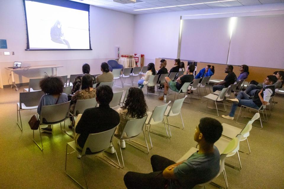 Community members watch a screen of a film during The Oklahoma Cine Latino Film Festival at Capitol Hill Library, Sunday, March 5, 2023.