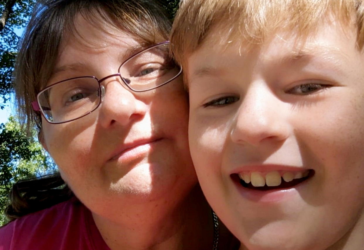 Jane Lightfoot spent months was being treated for a suspected ear infection, but further tests revealed it was actually a brain tumour. Pictured with her son, Charlie. (Brain Tumour Research/SWNS)