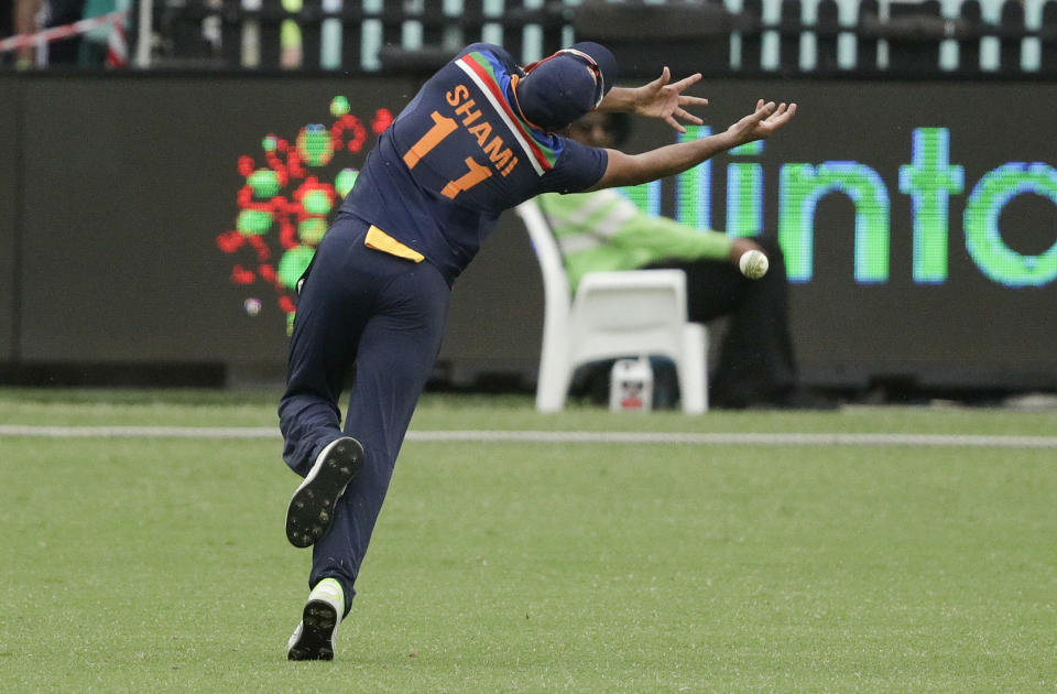 India's Mohammed Shami drops a catch during the one day international cricket match between India and Australia at the Sydney Cricket Ground in Sydney, Australia, Sunday, Nov. 29, 2020. (AP Photo/Rick Rycroft)