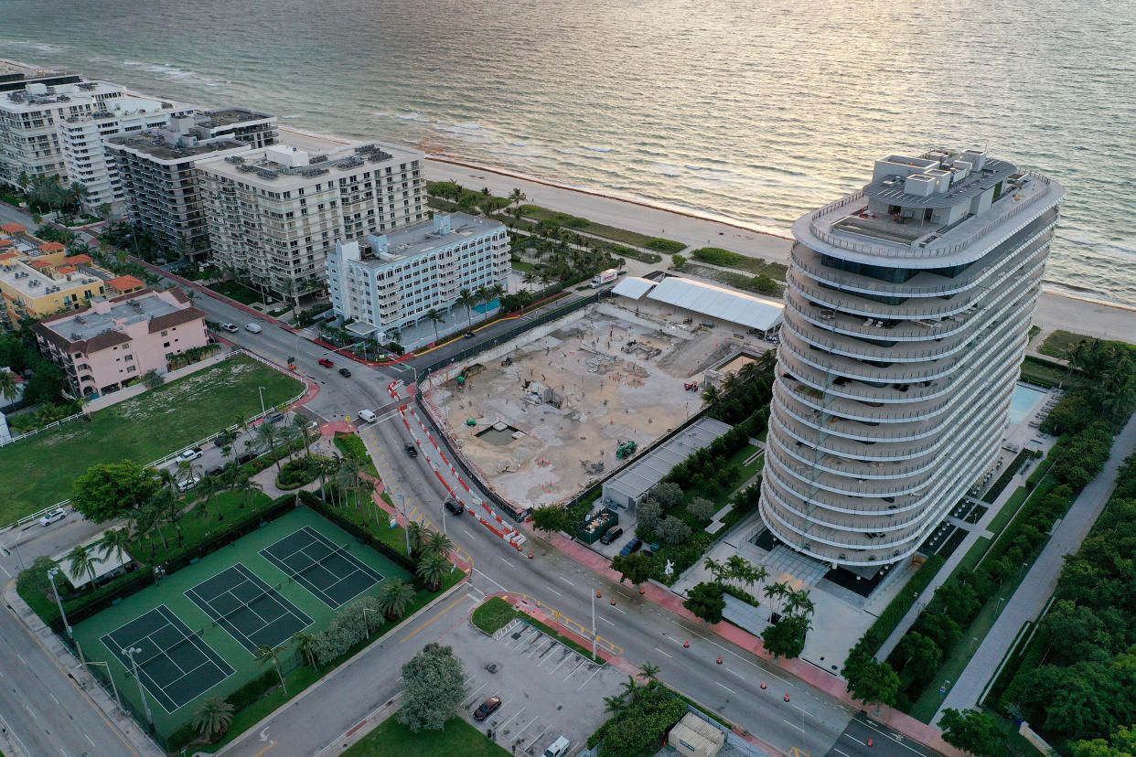 SURFSIDE, FLORIDA - JUNE 22: An aerial photo on June 22, 2022 in Surfside, Florida, shows the cleared lot where the 12-story Champlain Towers South apartment building once stood. This week marks the one-year anniversary of the tragic event in which the building partially collapsed on June 24, 2021, killing 98 people. (Photo by Joe Raedle/Getty Images)