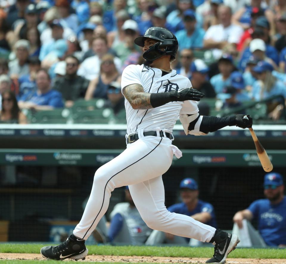 Detroit Tigers shortstop Javier Baez (28) singles against Toronto Blue Jays starting pitcher Chris Bassitt (40) during second-inning action at Comerica Park in Detroit on Sunday, July 9, 2023.