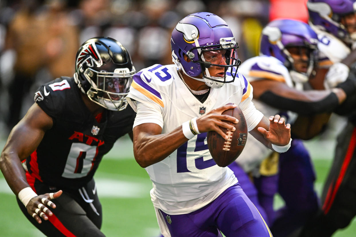 Joshua Dobbs (15) was thrust into action for the Vikings due to injury, and now he's trying to lead them to a win over the Falcons. (Photo by Rich von Biberstein/Icon Sportswire via Getty Images)