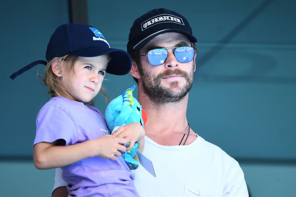 Actor Chris Hemsworth and daughter India Rose Hemsworth attend the swimming on day three of the Gold Coast 2018 Commonwealth Games at Optus Aquatic Centre on April 7, 2018 on the Gold Coast, Australia. Source: Getty