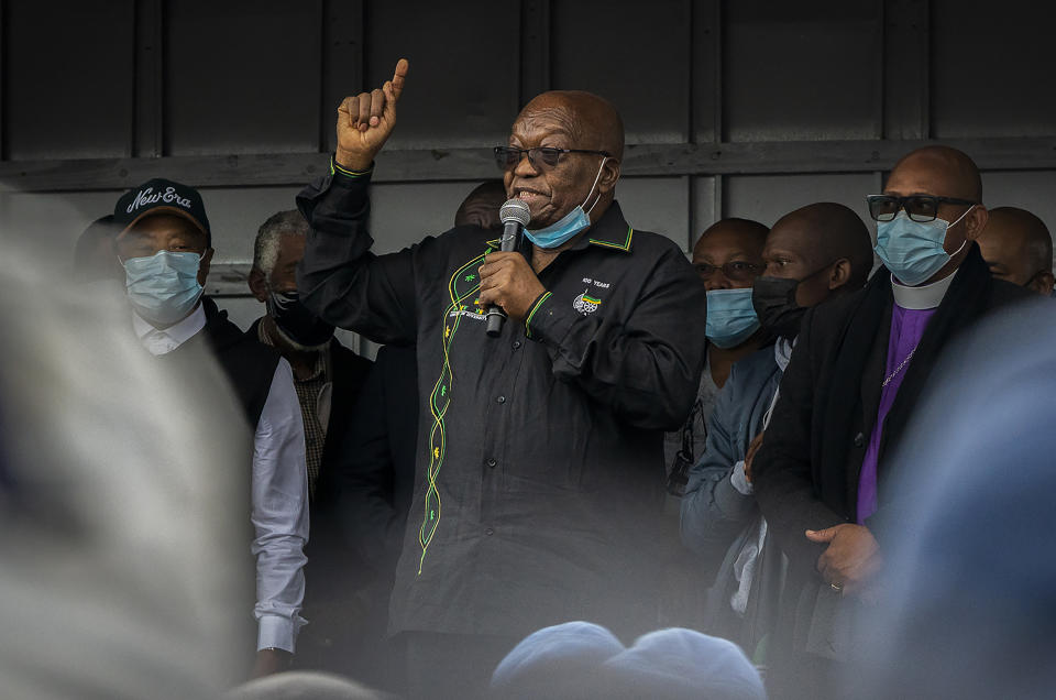 Former president Jacob Zuma addresses his supporters at his home in Nkandla, KwaZulu-Natal Natal Province, Sunday, July 4, 2021. The Constitutional Court will hear Zuma's urgent application on July 12 to rescind its order sentencing him to jail for 15 months for contempt of court. Zuma was initially supposed to hand himself over to authorities for his incarceration by Sunday. (AP Photo/Shiraaz Mohamed)