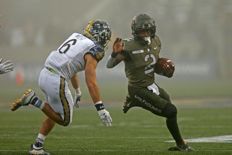 Dec 12, 2020; West Point, New York, USA; Army Black Knights quarterback Tyhier Tyler (2) carries against the Navy Midshipmen during the first half of the Army-Navy game at Michie Stadium. Mandatory Credit: Danny Wild-USA TODAY Sports