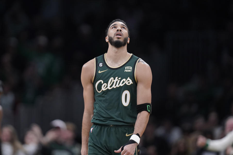 Boston Celtics forward Jayson Tatum (0) looks up in the second half of an NBA basketball game against the New York Knicks, Sunday, March 5, 2023, in Boston. (AP Photo/Steven Senne)