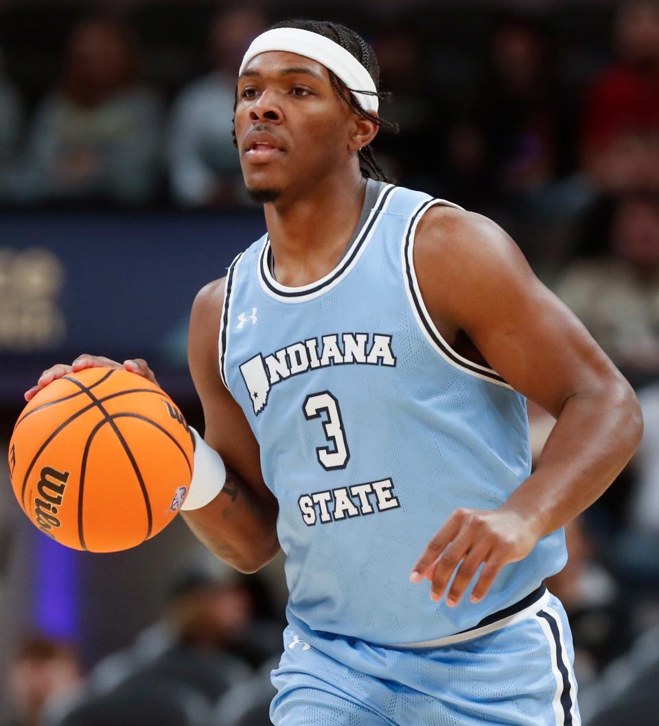 Indiana State's Ryan Conwell brings the ball up the court against Ball State during the NCAA men’s basketball game, Saturday, Dec. 16, 2023, at Gainbridge Fieldhouse in Indianapolis.