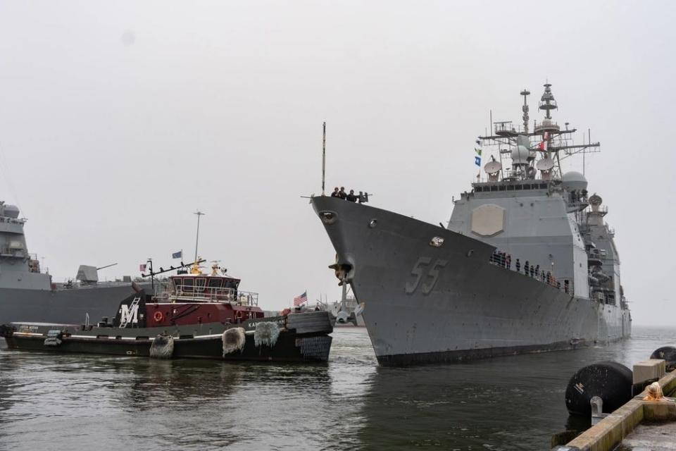 The guided-missile cruiser USS Leyte Gulf departs Naval Station Norfolk