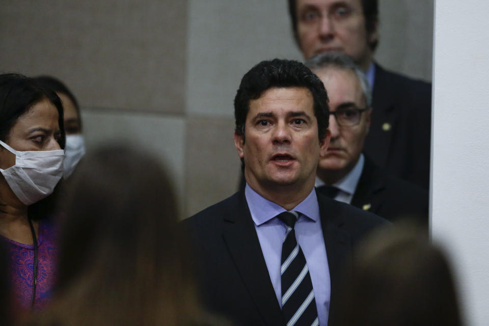 Brazil's Justice Minister Sergio Moro arrives to give a press conference to announce his resignation in Brasilia, Brazil, Friday, April 24, 2020. Moro made the announcement after Brazilian President Jair Bolsonaro changed the head of the country's federal police. (AP Photo/Eraldo Peres)