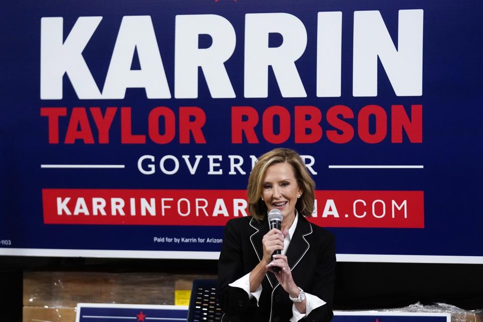 Karrin Taylor Robson, a Republican running for Arizona governor, speaks at a town hall event with former Republican New Jersey Gov. Chris Christie Friday, July 29, 2022, in Tempe, Ariz. (AP Photo/Ross D. Franklin)