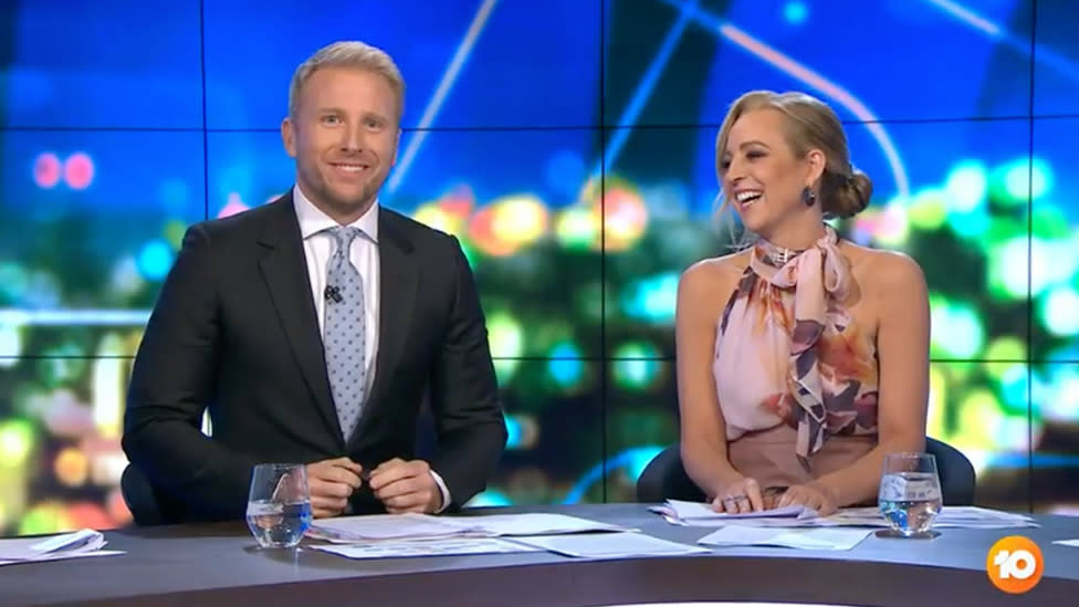 A photo of hosts Carrie Bickmore and Hamish Macdonald on set of The Project.