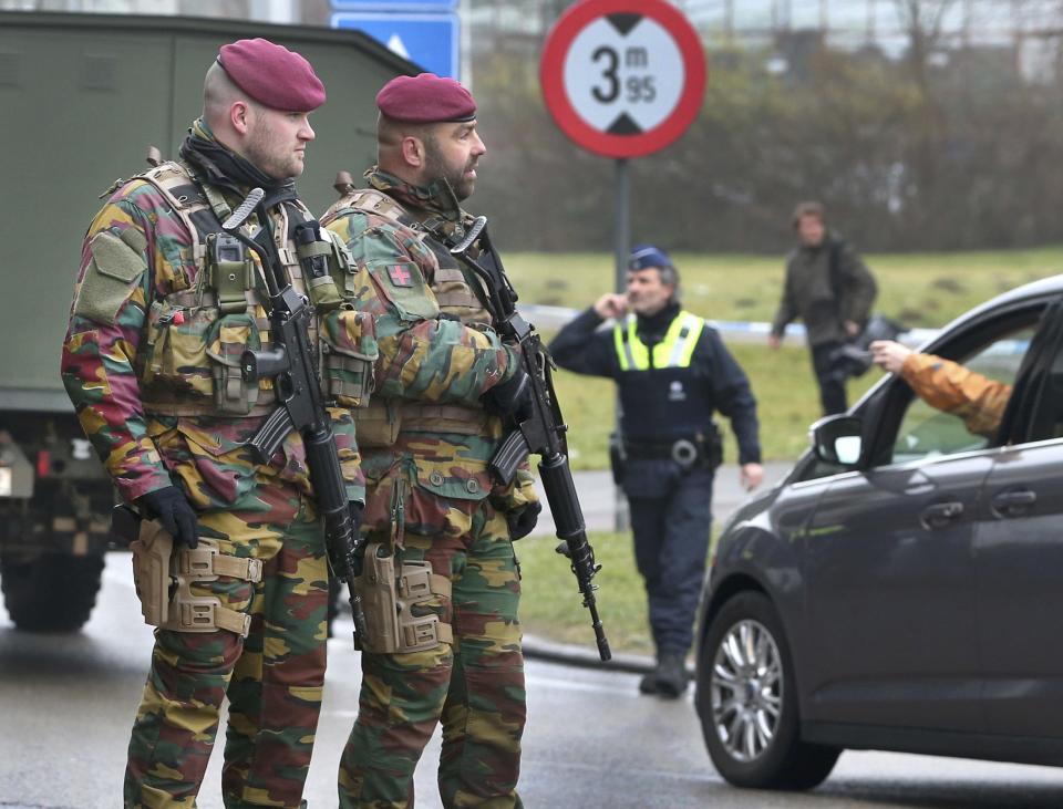 Belgian troops man a roadblock near Brussels' Zaventem airport following Tuesdays' bomb attacks in Brussels, Belgium, March 23, 2016. REUTERS/Charles Platiau