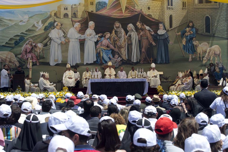 Pope Francis celebrates a mass in Manger Square next to the Church of the Nativity, in the West Bank city of Bethlehem