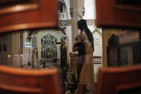 People attend a mass at the Carmen church in Panama City, ahead of Pope Francis' visit for World Youth Day in Panama City, Panama January 21, 2019. REUTERS/Henry Romero