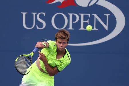 Aug 31, 2016; New York, NY, USA; Ryan Harrison of the United States serves against Milos Raonic of Canada (not pictured) on day three of the 2016 U.S. Open tennis tournament at USTA Billie Jean King National Tennis Center. Harrison won 6-7(4), 7-5, 7-5, 6-1. Mandatory Credit: Geoff Burke-USA TODAY Sports