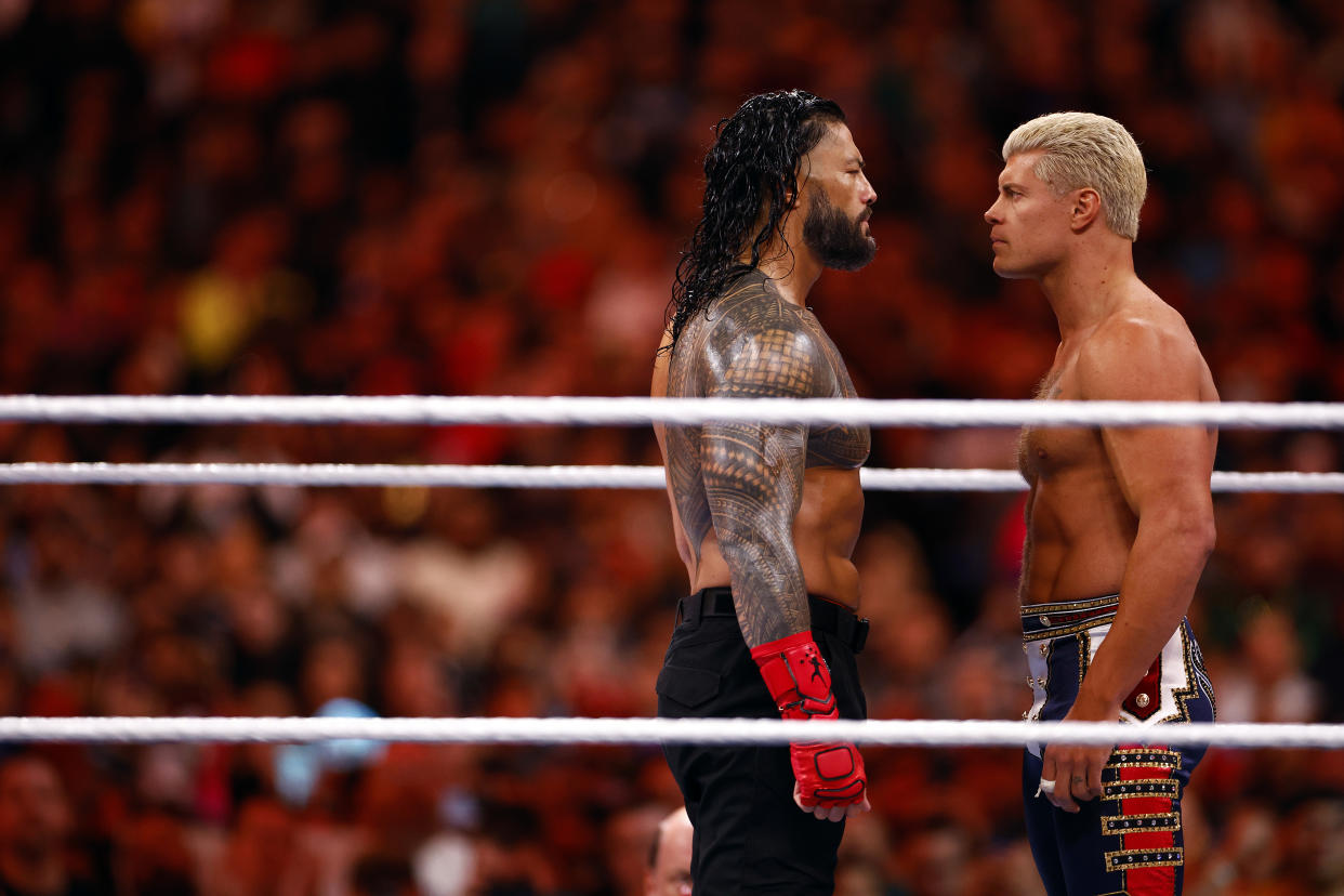 INGLEWOOD, CALIFORNIA - APRIL 02:  (L-R) Roman Reigns wrestles Cody Rhodes for Undisputed WWE Universal Title Match during WrestleMania Goes Hollywood at SoFi Stadium on April 02, 2023 in Inglewood, California.  (Photo by Ronald Martinez/Getty Images)