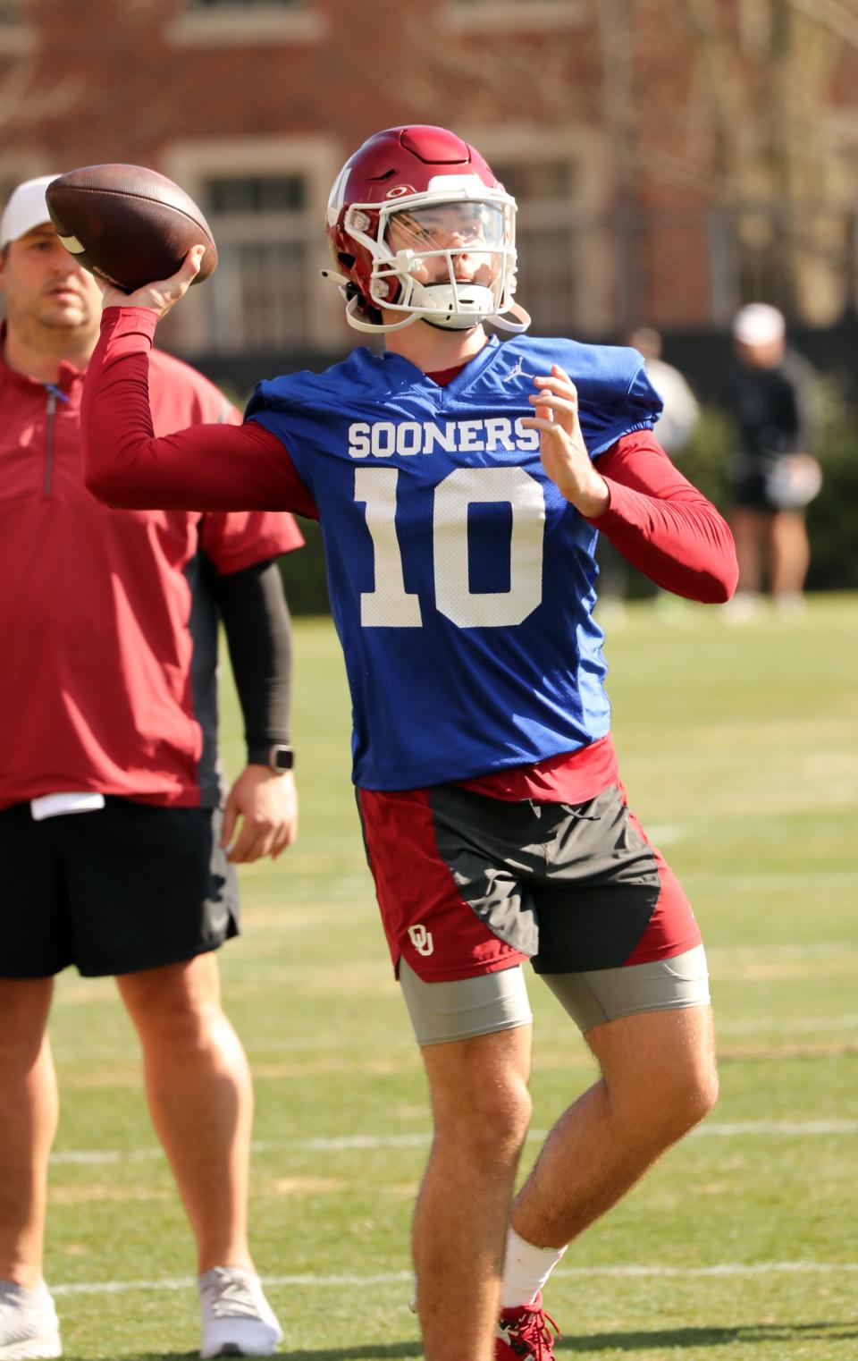 OU freshman quarterback Jackson Arnold (10) throws a pass during practice on March 21 in Norman.