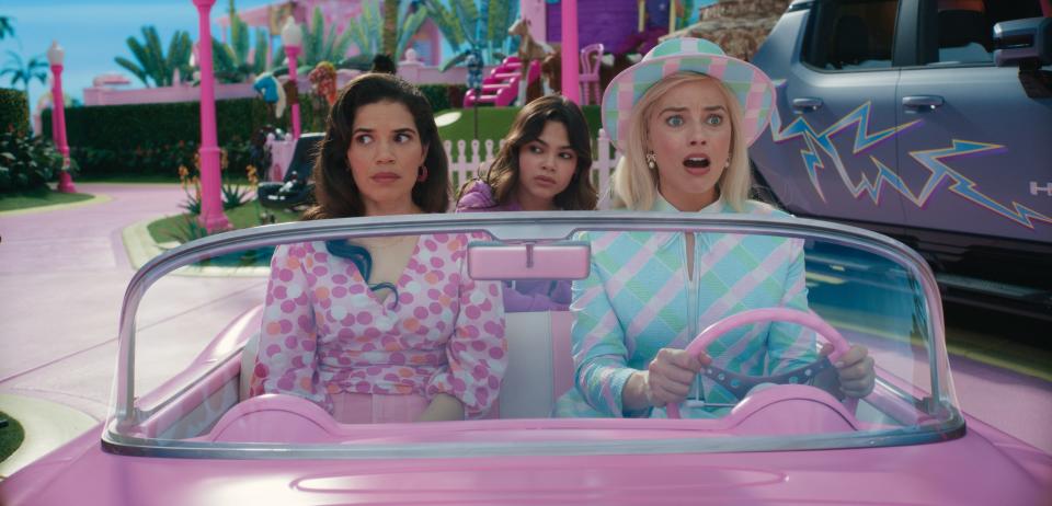America Ferrera, left, Ariana Greenblatt and Margot Robbie all star in "Barbie," the lone best picture Oscar nominee this year that doesn't feature images of characters smoking, according to a new report.