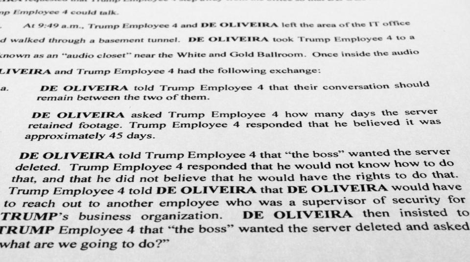 The updated indictment against former President Donald Trump, Walt Nauta and Carlos De Oliveira is photographed Friday, July 28, 2023. New allegations in the classified documents case against Trump deepen his legal jeopardy as he braces for possible additional indictments related to efforts to overturn the 2020 election. (AP Photo/Jon Elswick)