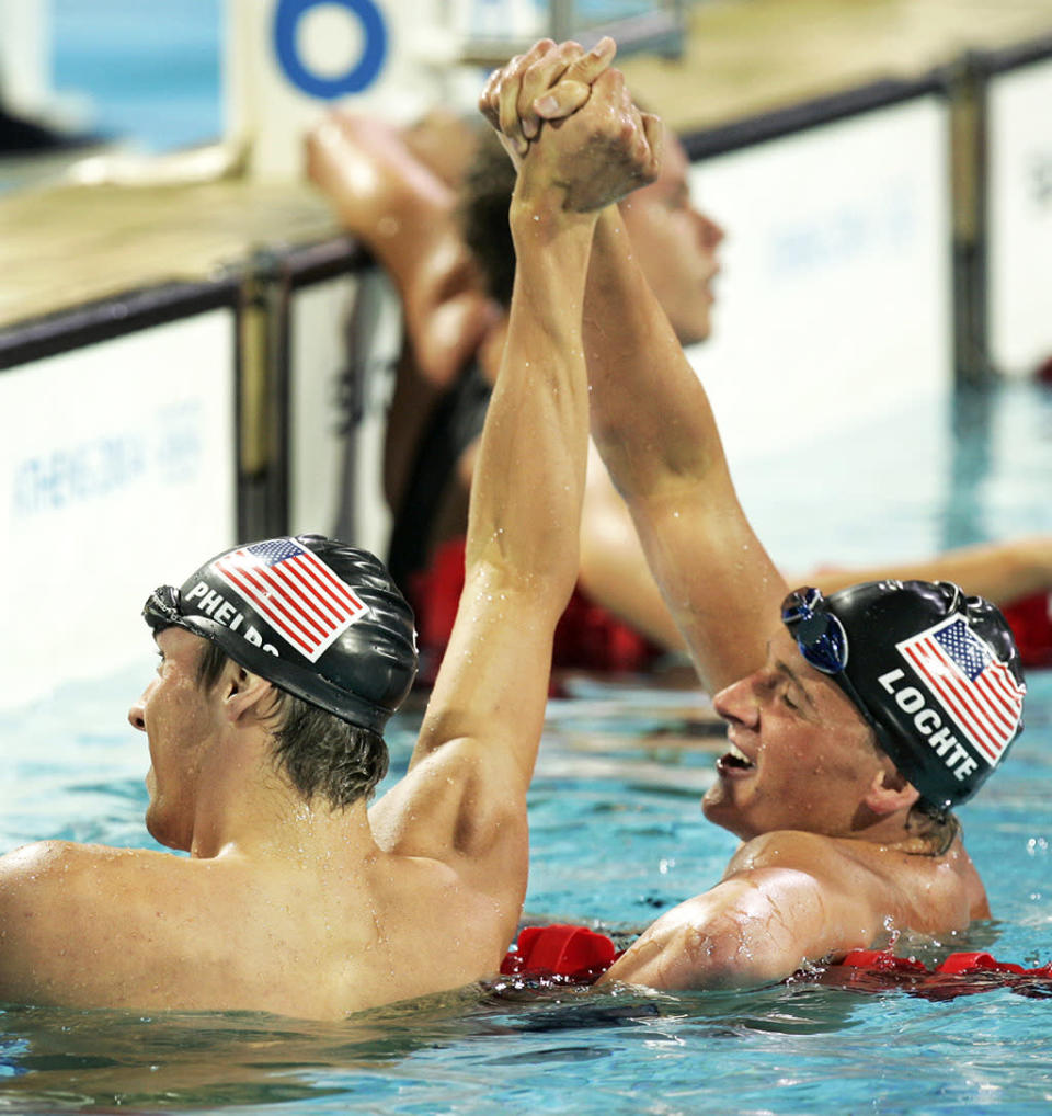 Phelps takes gold and Lochte earns silver in what would become their signature match-up, the 200m IM. (Credit: Mark J. Terrill/AP Photo)