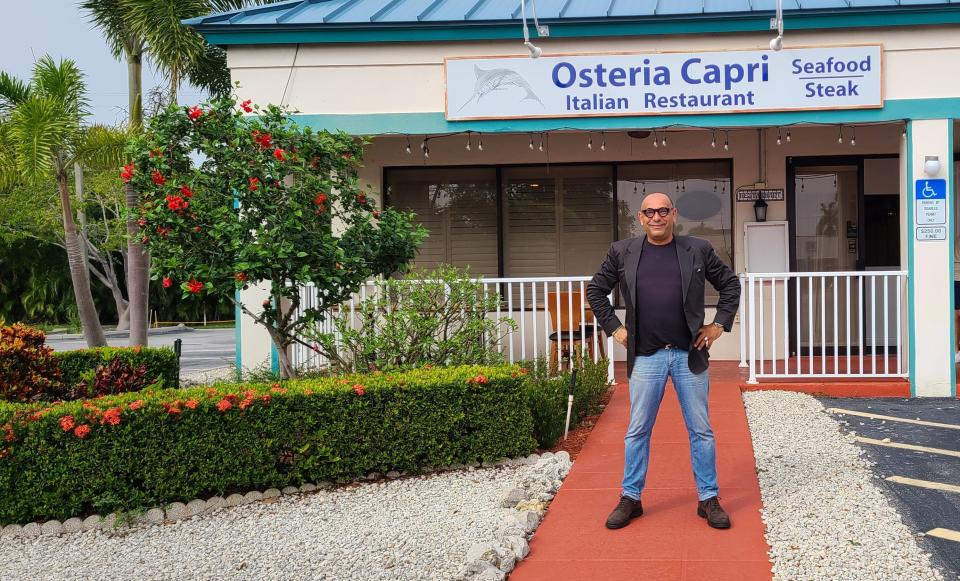 Chef AJ Black in front of Osteria Capri II on Marco Island.