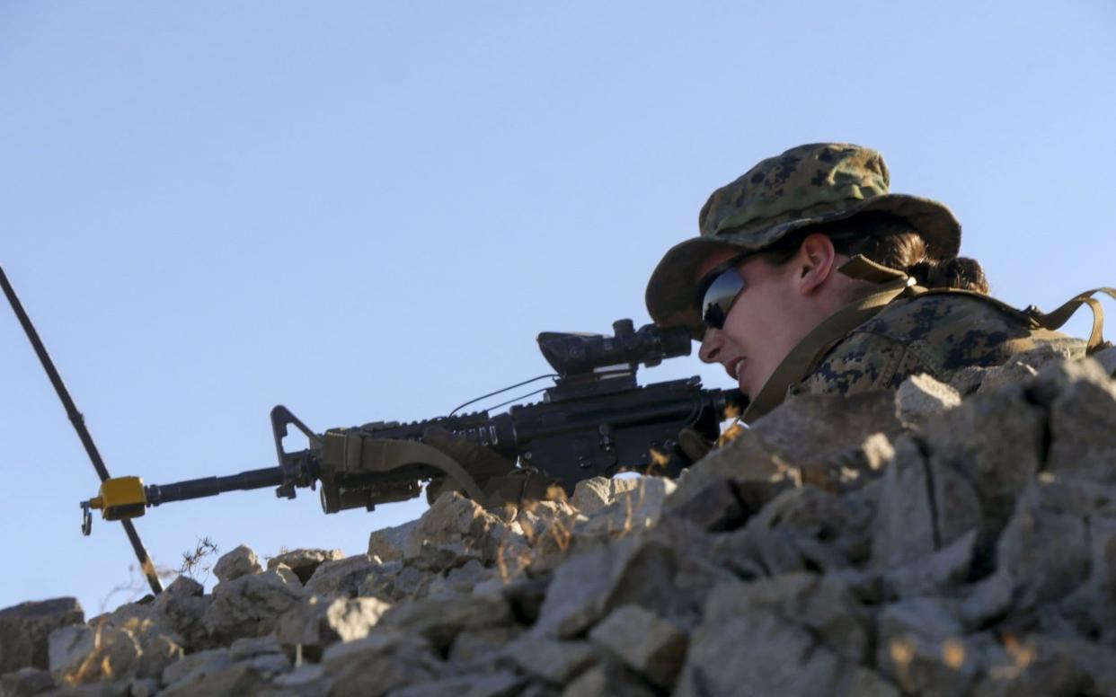 The Marine as she participates in an exercise during the Infantry Officer Course at Marine Corps Air Ground Combat Center Twentynine Palms, California, on September 18 - AFP