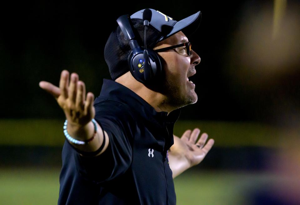 Farmington head coach reacts to an official's call as the Farmers battle Elmwood/Brimfield in the second half of their varsity football game Friday, Sept. 22, 2023 in Farmington. The Farmers defeated the Trojans 30-26.