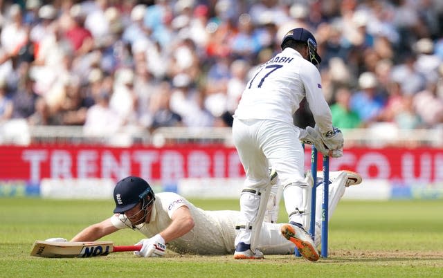 Jonny Bairstow dives in