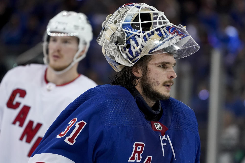 New York Rangers goaltender Igor Shesterkin (31) skates back to the goal before play restarts during the second period of Game 6 of an NHL hockey Stanley Cup second-round playoff series against the Carolina Hurricanes, Saturday, May 28, 2022, in New York. (AP Photo/John Minchillo)