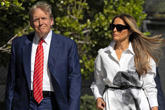 <p>Joe Raedle/Getty</p> Donald and Melania Trump prepare to vote in Florida's Republican primary at a Palm Beach polling station on March 19, 2024