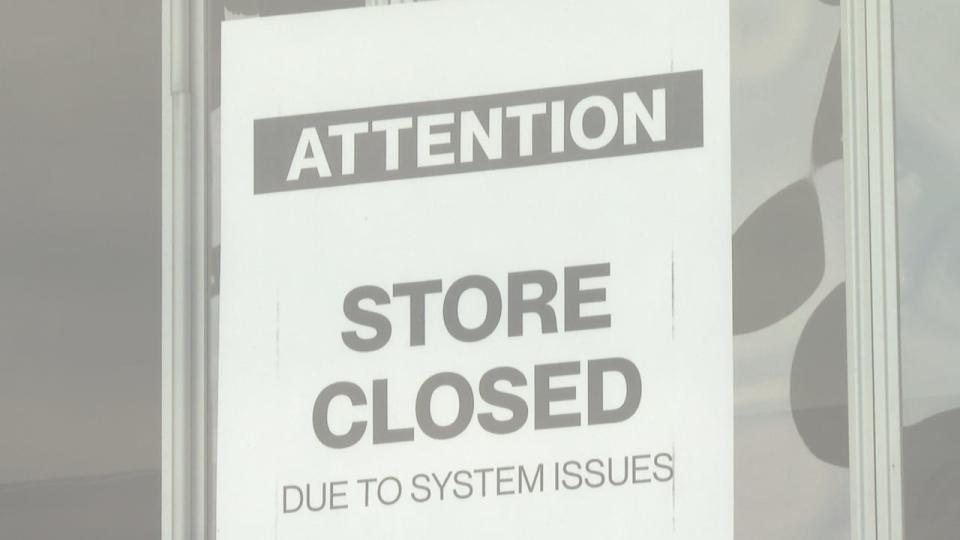 This closed sign greets customers when they arrive at the Hudson's Bay store at Devonshire Mall.