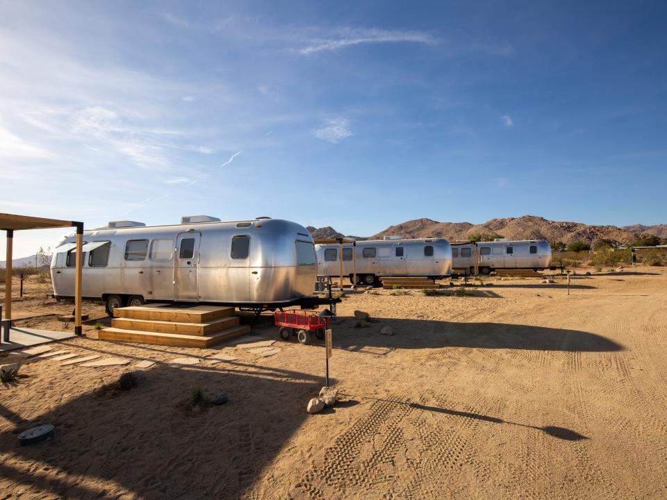 A row of Airstream trailers at Autocamp's Joshua Tree location.