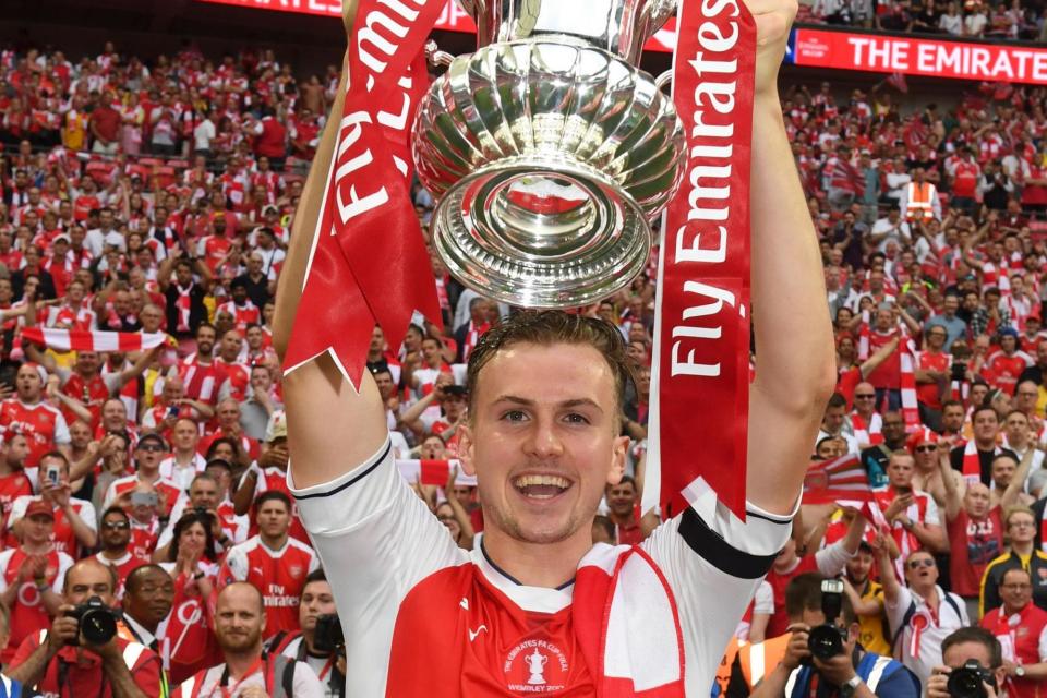 Holding celebrating with Arsenal fans at Wembley: Arsenal FC via Getty Images