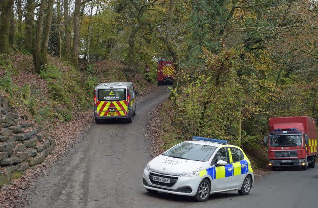 Police vehicles and fire engines drives towards the scene in Llangammarch Wells, Powys