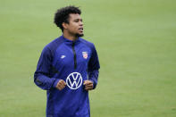 Weston McKennie warms up during soccer practice for the U.S. Men's National Team Tuesday, Aug. 31, 2021, in Nashville, Tenn. (AP Photo/Mark Humphrey)