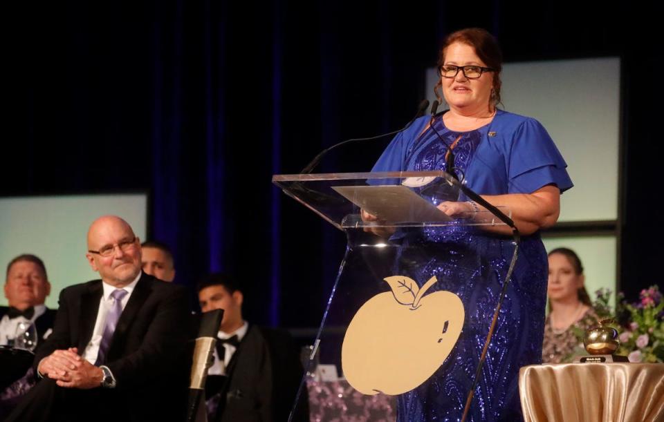 Golden Apple winner Michelle Smith delivers her speech. The 2024 Golden Apple award winning teachers were honored at the Teacher Recognition Banquet on Friday, April 19, 2023, in Fort Myers. The event, sponsored by the Foundation for Lee County Public Schools, is in its 37th year of the program. 
The winners included: Sara Kizzire of Lehigh Senior High; Michelle Smith of Lehigh Senior High; Jill Klausing of Dunbar High; Christine Bartz of Pine Island Elementary; Jessica Lisi of Tanglewood Elementary; and Sarah Thornburg of Cypress Lake High.