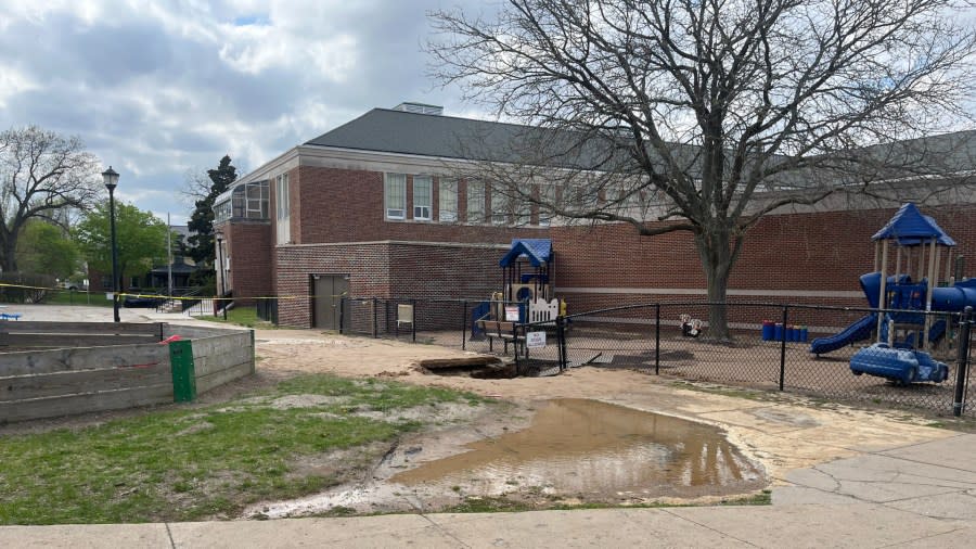 A sinkhole outside the playground at Campus Elementary School in Grand Rapids. (April 27, 2024)