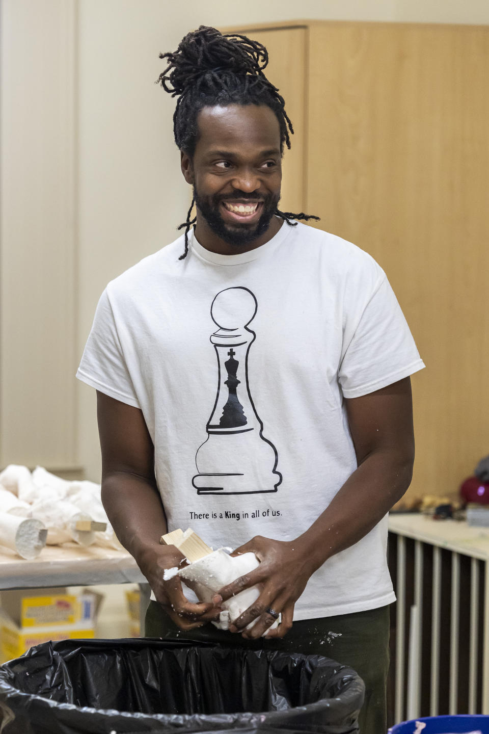 Artist Stephen Hayes works on molded hands in Charleston, S.C., Saturday, Feb. 18, 2023. Hayes will use the molds to make a memorial for 36 enslaved people whose bodies were unearthed in Charleston in 2013 during a construction project for the Gaillard Center. (AP Photo/Mic Smith)