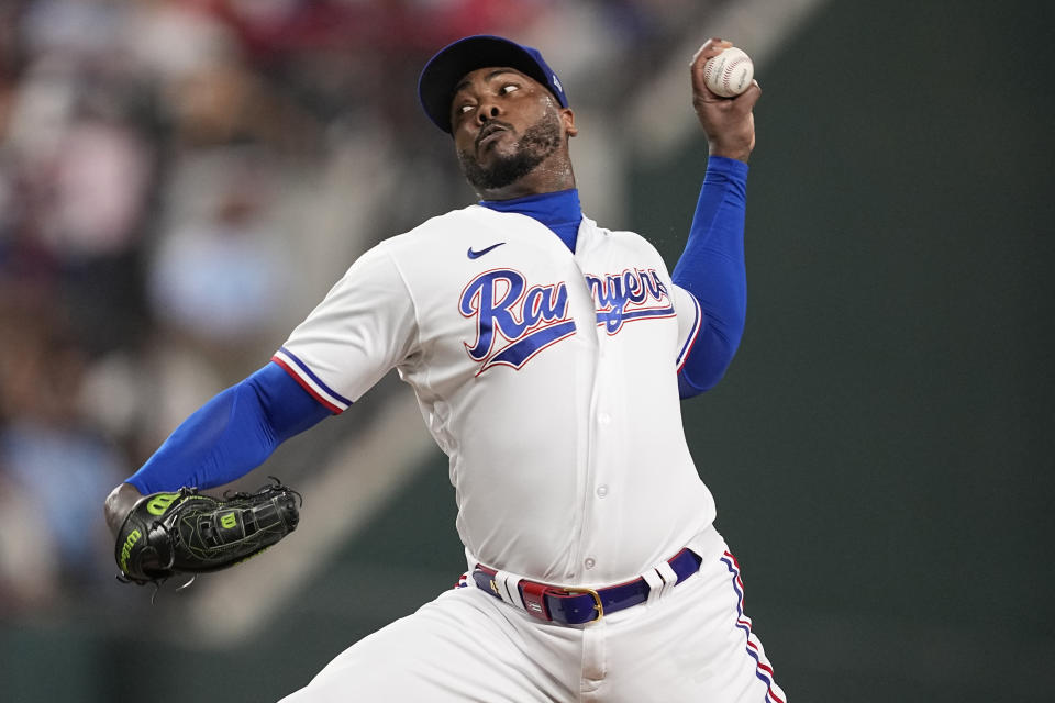 Texas Rangers' Aroldis Chapman pitches in theeighth inning of Game 3 of a baseball AL Division Series against the Baltimore Orioles on Tuesday, Oct. 10, 2023, in Arlington, Texas. (AP Photo/Tony Gutierrez )