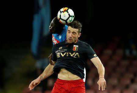 Soccer Football - Serie A - Napoli vs Genoa - Stadio San Paolo, Naples, Italy - March 18, 2018 Genoa's Andrej Galabinov in action with Napoli's Kalidou Koulibaly REUTERS/Ciro De Luca