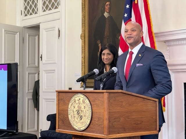 Maryland Gov. Wes Moore speaks during a budget presentation Friday at the State House in Annapolis. He is joined by Lt. Gov. Aruna Miller.