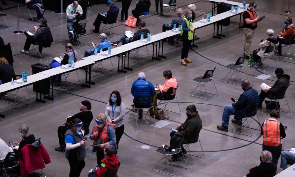 Patients wait and are observed for an adverse reactions following their first dose of the Covid-19 vaccine at the Amazon Meeting Center in downtown Seattle.