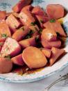 <p>These glazed sweet potatoes are both sweet and spicy — the best of both worlds! Plus, they only take 30 minutes to make, so it won't add too much to your cooking schedule.</p><p><a href="https://www.womansday.com/food-recipes/food-drinks/recipes/a38027/sweet-potatoes-ancho-maple-glaze-recipe-clx1111/" rel="nofollow noopener" target="_blank" data-ylk="slk:Get the recipe for Sweet Potatoes with Ancho-Maple Glaze.;elm:context_link;itc:0;sec:content-canvas" class="link "><em>Get the recipe for Sweet Potatoes with Ancho-Maple Glaze.</em></a></p>
