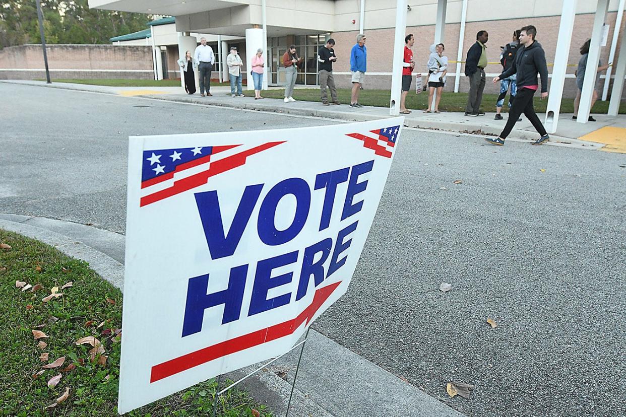 Voters wait in line to cast their votes Tuesday Nov. 8, 2022 at Belville Elementary in Leland, N.C. Ballots included races for the U.S. Senate, U.S. House of Representatives, N.C. Senate, N.C. House of Representatives as well as boards of commissioners, school boards, judges and sheriffs among others.