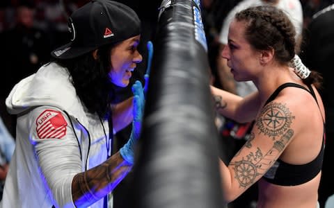 Amanda Nunes gives advice to her girlfriend Nina Ansaroff  - Credit: Zuffa LLC