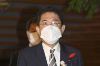 Japanese Prime Minister Fumio Kishida speaks to the media at his office in Tokyo Thursday morning, Oct. 6, 2022. North Korea launched two ballistic missiles toward its eastern waters on Thursday, as the United States redeployed one of its aircraft carriers near the Korean Peninsula in response to Pyongyang's previous launch of a powerful nuclear-capable missile over Japan. (Minoru Iwasaki/Kyodo News via AP)