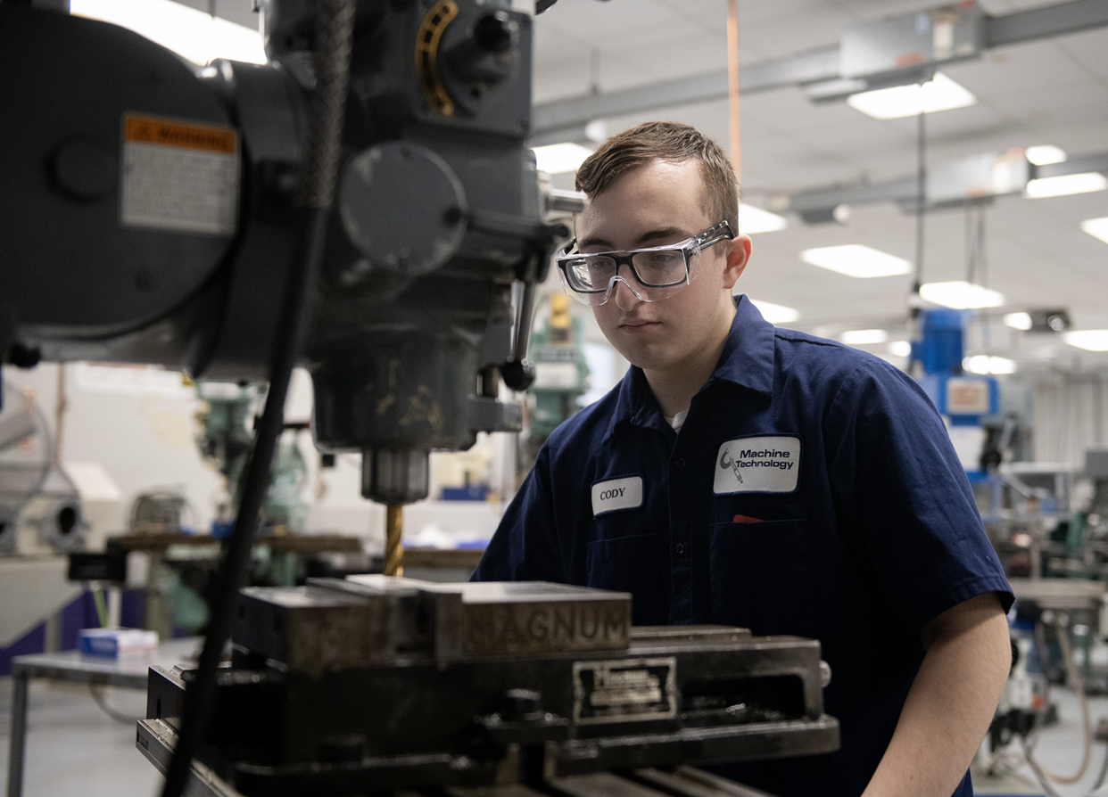 Cody Barrett, 17, prepares to cut aluminum at Barberton High School.