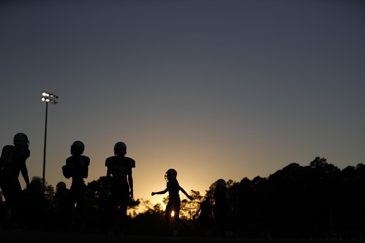 An L.A. high school football coach was fired for reportedly failing to inform parents when students allegedly spiked practice water with a male enhancement drug. (AP)